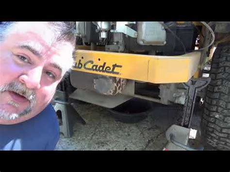 Step 2 Place a piece of cardboard under the work area to catch oil drips. . Cub cadet zero turn hydraulic fluid